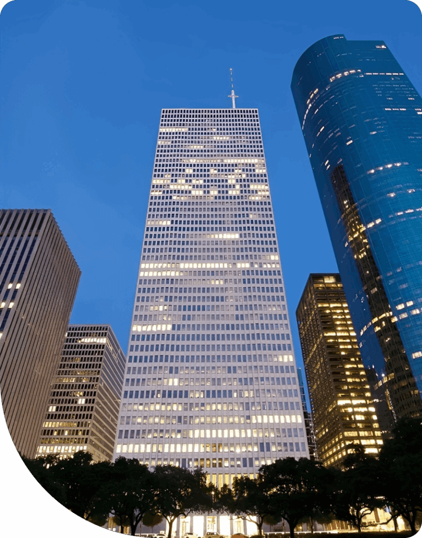 Tall skyscrapers against a twilight sky.