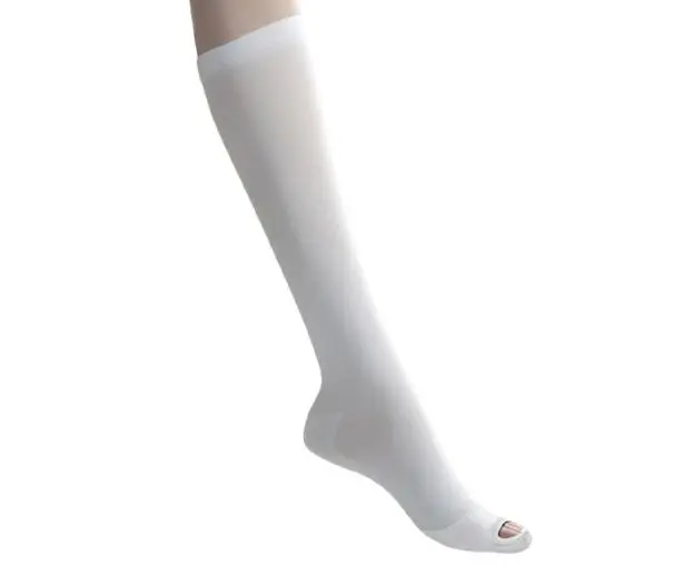 White knee-high open-toe compression stocking.