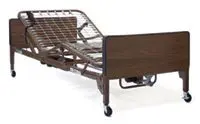 Adjustable hospital bed with wheels and wooden side panels.