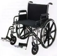 Compact folding black wheelchair with removable footplates