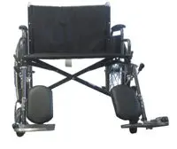 A black wheelchair with padded footrests and armrests.