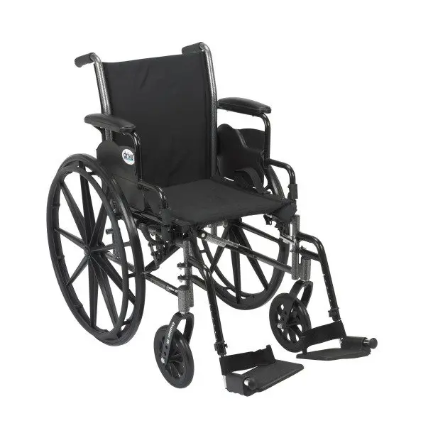 Black manual wheelchair with large rear wheels and adjustable footrests.