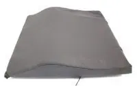 Dark gray fabric with slight wrinkles on a flat surface.