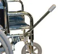 Close-up of a wheelchair brake lever and front wheel.