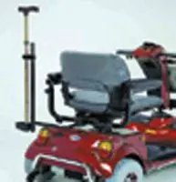 A red mobility scooter with a gray seat and a walking cane attached.