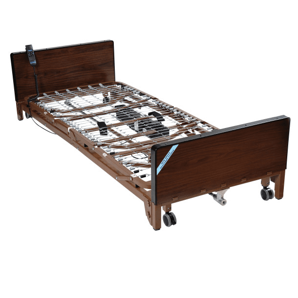 Adjustable hospital bed with wheels and wooden headboard and footboard.