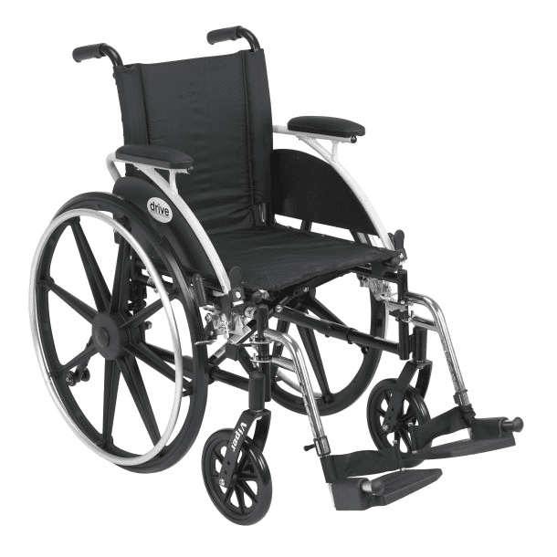 Black manual wheelchair with large rear wheels and footrests.