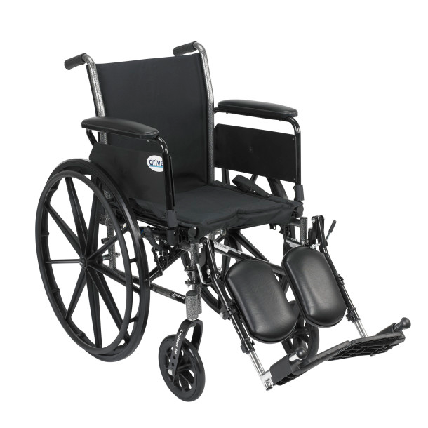 A black manual wheelchair with footrests and large rear wheels.