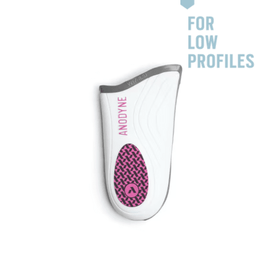 White facial cleansing brush with pink silicone bristles for low profiles.