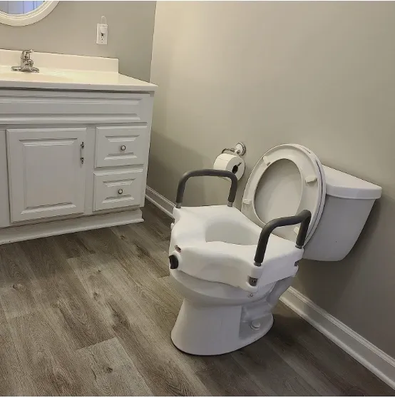 Adult toilet seat with child potty seat attached for easier use.