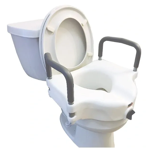 Raised toilet seat with handles for elderly or disabled.