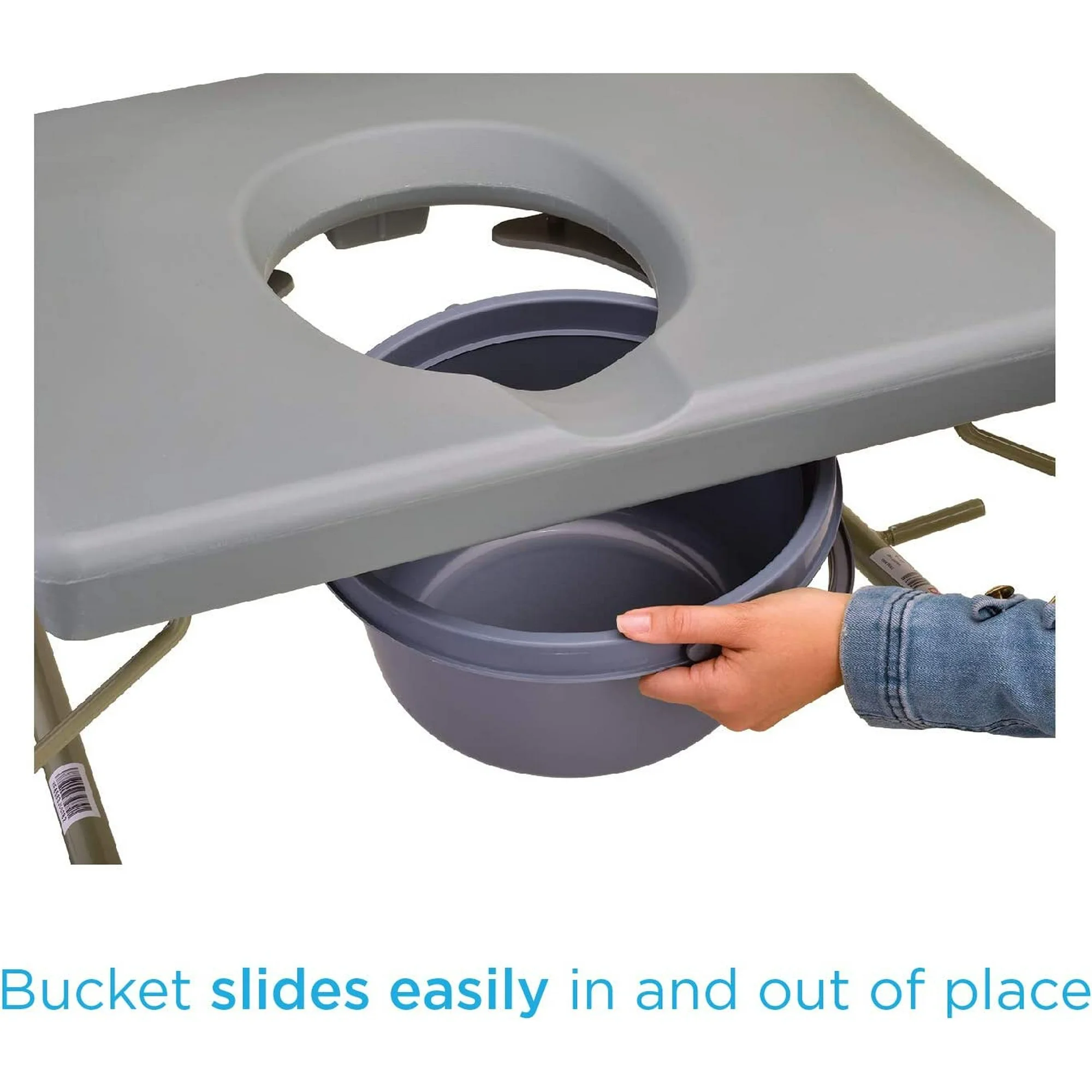 A portable massage table with a removable bucket sliding in and out.